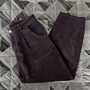 black denim trousers